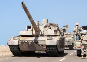 Yemeni government forces' tanks and armoured vehicles watch as tanks pass on the road leading to the southwestern port of Mokha after they recaptured the town from Shiite Huthi rebels on Jan. 23, 2017. (Credit: Saleh Al-Obeidi/AFP/Getty Images)