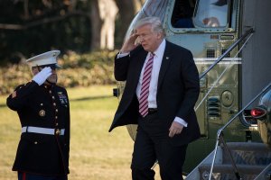 President Donald Trump salutes as he exits Marine One on the South Lawn of the White House, Jan. 26, 2017, in Washington, DC. (Credit: Drew Angerer/Getty Images)
