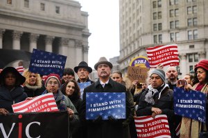 Muslims and local immigration activists participate in a prayer and rally against President Donald Trump's immigration policies on Jan. 27, 2017, in New York City. (Credit: Spencer Platt/Getty Images)