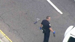 A hatchet could be seen on the ground in Westchester where an investigation was taking place after a pursuit ended on Jan. 18, 2017. (Credit: KTLA) 