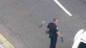 A hatchet could be seen on the ground in Westchester where an investigation was taking place after a pursuit ended on Jan. 18, 2017. (Credit: KTLA)