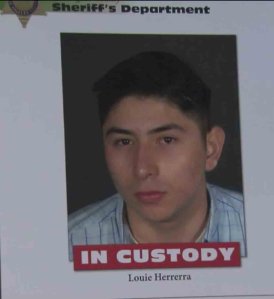 Louie Herrera is seen in a booking photo shown at a sheriff's news conference on Jan. 26, 2017.