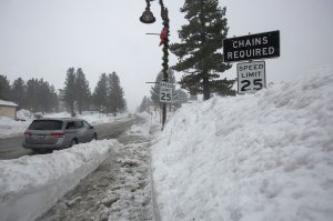 Snow piles continue to grow in Mammoth Lakes, California, January 9, 2017 as a series of strong storms moves through. (Credit: David McNew/AFP/Getty Images)