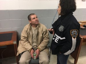 Joaquin "El Chapo" Archivaldo Guzman Loera is shown with an NYPD official in a photo provided to CNN from a  law enforcement source on Jan. 19, 2017.