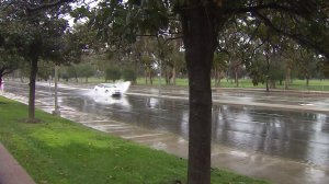 Roadways were slick with rain in Encino on Jan. 22, 2017. (Credit: KTLA)