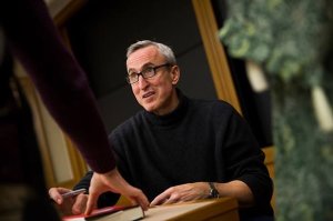 Gary Taubes signs a copy of his book, "The Case Against Sugar"