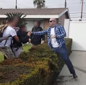 Cellphone video recorded by a witness shows an altercation between an off-duty LAPD officer, right, and teens in Anaheim on Feb. 22, 2017.