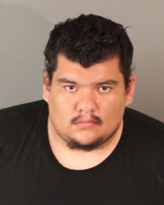 Fernando Figueroa is shown in a booking photo distributed by Riverside police on Feb. 17, 2017.