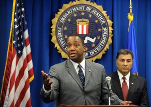 U.S. Attorney Andre Birotte Jr., left, and Steven Martinez, Assistant Director of the FBI in Los Angeles speak to reporters on Dec. 14, 2010, in Los Angeles during a press conference. (Credit: GABRIEL BOUYS/AFP/Getty Images)