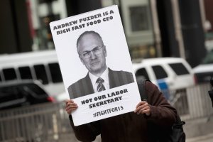 Fight for $15 workers protest the nomination of Andy Puzder for labor secretary on Jan. 26, 2017, in Chicago. (Credit: Scott Olson/Getty Images)