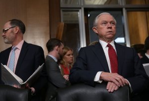 Sen. Jeff Sessions, right, a committee member, waits for the beginning of a meeting of Senate Environment and Public Works Committee Feb. 2, 2017, on Capitol Hill. (Credit: Alex Wong/Getty Images)