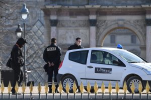 Policemen stand guard near the Louvre museum on February 3, 2017 in Paris, after a soldier patrolling at the museum shot and seriously injured a machete-wielding man who yelled 'Allahu Akbar' ('God is greatest') as he attacked security forces, police said. (Credit: ERIC FEFERBERG/AFP/Getty Images)