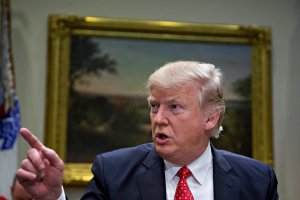 President Donald Trump speaks as he meets with county sheriffs during a listening session in the Roosevelt Room of the White House on February 7, 2017 in Washington, DC. The Trump administration will return to court Tuesday to argue it has broad authority over national security and to demand reinstatement of a travel ban on seven Muslim-majority countries that stranded refugees and triggered protests. (Credit: Andrew Harrer - Pool/Getty Images)