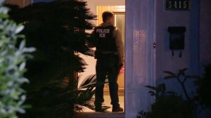 In this file photo, an ICE agent is seen during an operation in Los Angeles. (Credit: Michael Johnson / U.S. Immigration and Customs Enforcement
