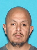 Christian Omar Jaciento is shown in a DMV photo. (Credit: San Bernardino Police Department)