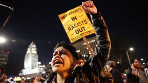 Protesters converge on the Metropolitan Detention Center in downtown Los Angeles during a rally against immigration arrests on Feb. 9, 2017. (Credit: Marcus Yam / Los Angeles TImes)