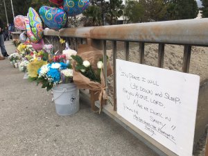 People left flowers and balloons at a spot near the L.A. River not far from where a body believed to be missing teen Elias Rodriguez was found on Feb. 25, 2017. (Credit: Elizabeth Espinosa / KTLA) 