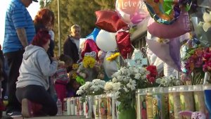 Candles and balloons were placed at a memorial in honor of Elias Rodriguez on Feb. 27, 2017. (Credit: KTLA)