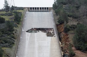 An eroded section of the Oroville Dam spillway is seen in this image provided by the California Department of Water