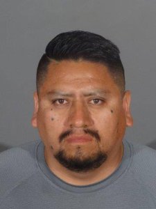 Eden Sergio Ortega is seen in a booking photo released by the Alhambra Police Department. 