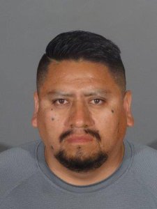Eden Sergio Ortega is seen in a booking photo released by the Alhambra Police Department.