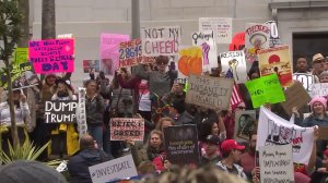 Protesters gather on the steps of Los Angeles City Hall for "Not My Presidents Day" event on Feb. 20, 2017. (Credit: KTLA)