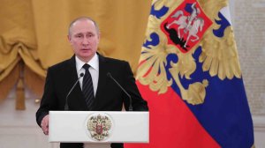 Russian President Vladimir Putin delivers a speech during a reception dedicated to the celebration of the New Year at the Kremlin in Moscow on December 28, 2016. (Credit: MICHAEL KLIMENTYEV/AFP/Getty Images)