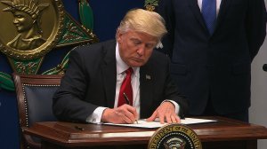 President Donald Trump took executive action on curbing access visas and limiting refugees coming to the US. (Credit: CNN)