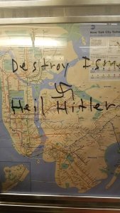 A group of New York subway passengers used hand sanitizer to remove Nazi graffiti from an uptown 1 train on Saturday night.