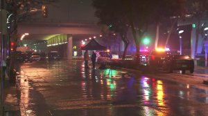 Authorities investigate a deadly officer-involved shooting on Feb. 6, 2017. (Credit: KTLA)
