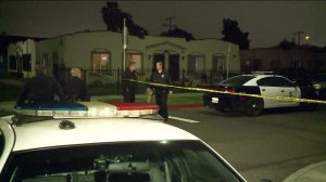 Officers respond to the scene where a 92-year-old man shot his wife on Feb. 14, 2017. (Credit: KTLA)