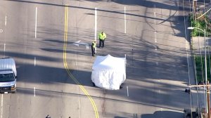 Police investigate a fatal hit-and-run crash in Van Nuys on Feb. 23, 2017. (Credit: KTLA)