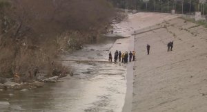 Officials responded to the L.A. River on Feb. 25, 2017 to recover a body found on a small island believed to be that of missing 14-year-old Elias Rodriguez. (Credit: KTLA)