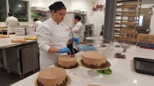 Cakes are decorated ahead of the Porto's Bakery grand opening in Buena Park on March 1, 2017. (Credit: Christopher Gierowski / KTLA) 