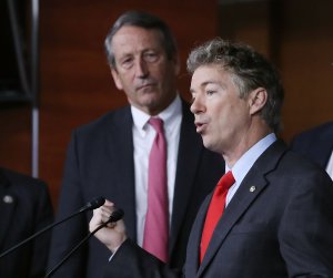 Sen. Rand Paul of Kentucky and Rep. Mark Sanford of South Carolina speak to the media at a news conference to discuss their Affordable Care Act replacement legislation, on Capitol Hill Feb. 15, 2017, in Washington, D.C. (Credit: Mark Wilson/Getty Images)