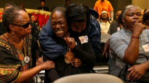 Lisa Hines, the mother of Wakiesha Wilson, is comforted after the Police Commission determined that no LAPD officers were "substantially involved" in her daughter's death. (Credit: Irfan Khan / Los Angeles Times)