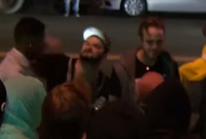 A man is shown being punched at a political rally in Laguna Beach in August 2017. (Credit: Laguna Beach Police Department)