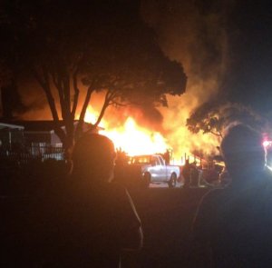 A home in San Clemente was engulfed in flames after an explosion Thursday morning. (Credit: Scott Welch via Instagram)