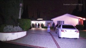 Police respond to a home-invasion robbery in Fullerton. (Credit: Southern Counties News)