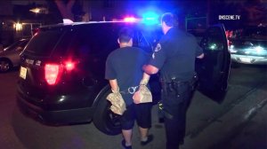 Police arrest a man suspected of fatally stabbing his mother in Fullerton on Aug. 15, 2017. (Credit: OnScene.TV)