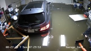 A garage in Houston fills with water during Hurricane Harvey. (Credit: Dani Rosiman)