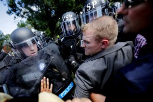 Protesters clash with police following a white nationalist rally in Charlottesville on August 12, 2017. (Credit: Chip Somodevilla/Getty Images)