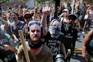 Anti-fascist counter-protesters wait outside Emancipation Park to hurl insluts as white nationalists, neo-Nazis and members of the "alt-right" are forced out after the "Unite the Right" rally was declared an unlawful gathering Aug. 12, 2017 in Charlottesville, Virginia. (Credit: Chip Somodevilla / Getty Images)