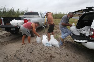 Residents fill sandbags as people prepare for approaching Hurricane Harvey on August 25, 2017 in Corpus Christi, Texas. (Credit: Joe Raedle/Getty Images)