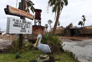 A damaged restaurant on the main street after Hurricane Harvey hit Port Aransas, Texas on Aug. 27, 2017. (Credit: Mark Ralston / AFP / Getty Images)