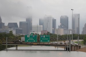 Downtown Houston and submerged highways are seen Aug. 27, 2017, as the city battles with tropical storm Harvey and resulting floods. (Credit: Thomas B. Shea / AFP / Getty Images)