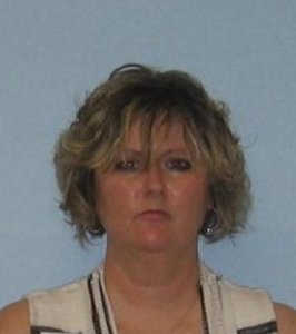 Kimberly Fuller McCabe is seen in a booking photo released by police.