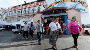Shoppers exit the El Mercado shopping center in Boyle Heights. A City Council committee has rejected a nonprofit developer's plan to build housing for the homeless nearby. (Credit: Mel Melcon / Los Angeles Times)