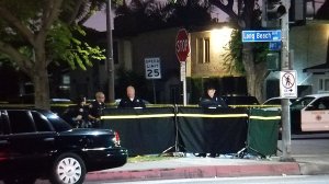 Police investigate a deadly hit-and-run crash in Long Beach on Aug. 14, 2017. (Credit: KTLA)