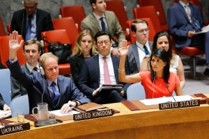 U.S. Ambassador to the United Nations Nikki Haley and Britain's Ambassador Matthew Rycroft vote on a U.S.-drafted resolution toughening sanctions on North Korea, at the United Nations Headquarters in New York City on August 5, 2017. (Credit:  Eduardo Munoz Alvarez/AFP/Getty Images)